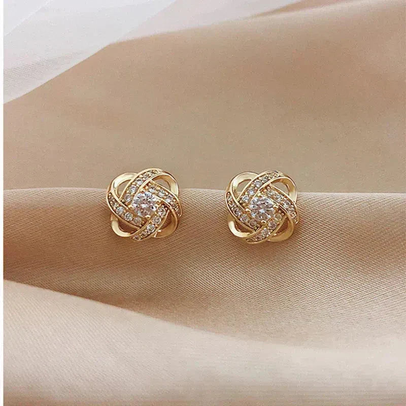 Floral Twist cross earrings