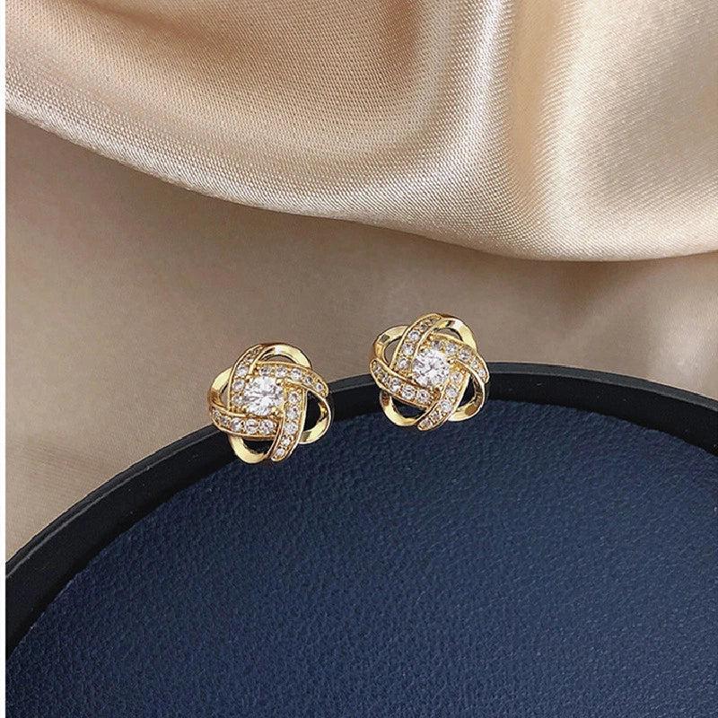 Floral Twist cross earrings
