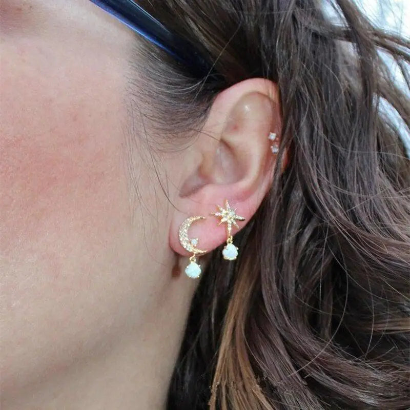 Moon and star earrings in gold and opal