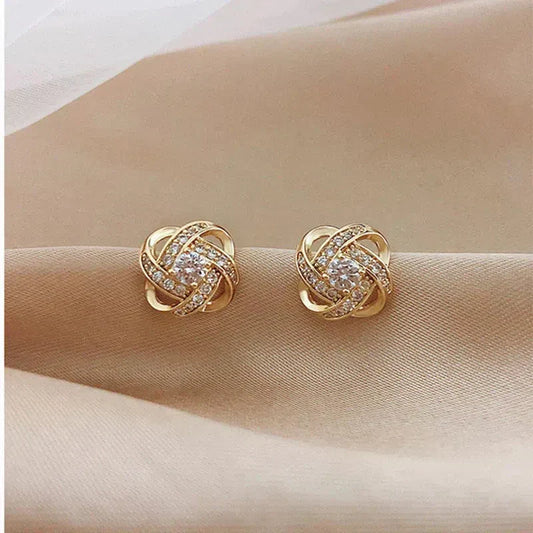 Floral Twist cross earrings